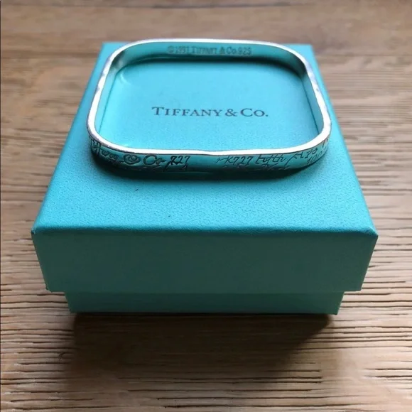 Tiffany & Co Love notes bracelet silver mint cond price firm!